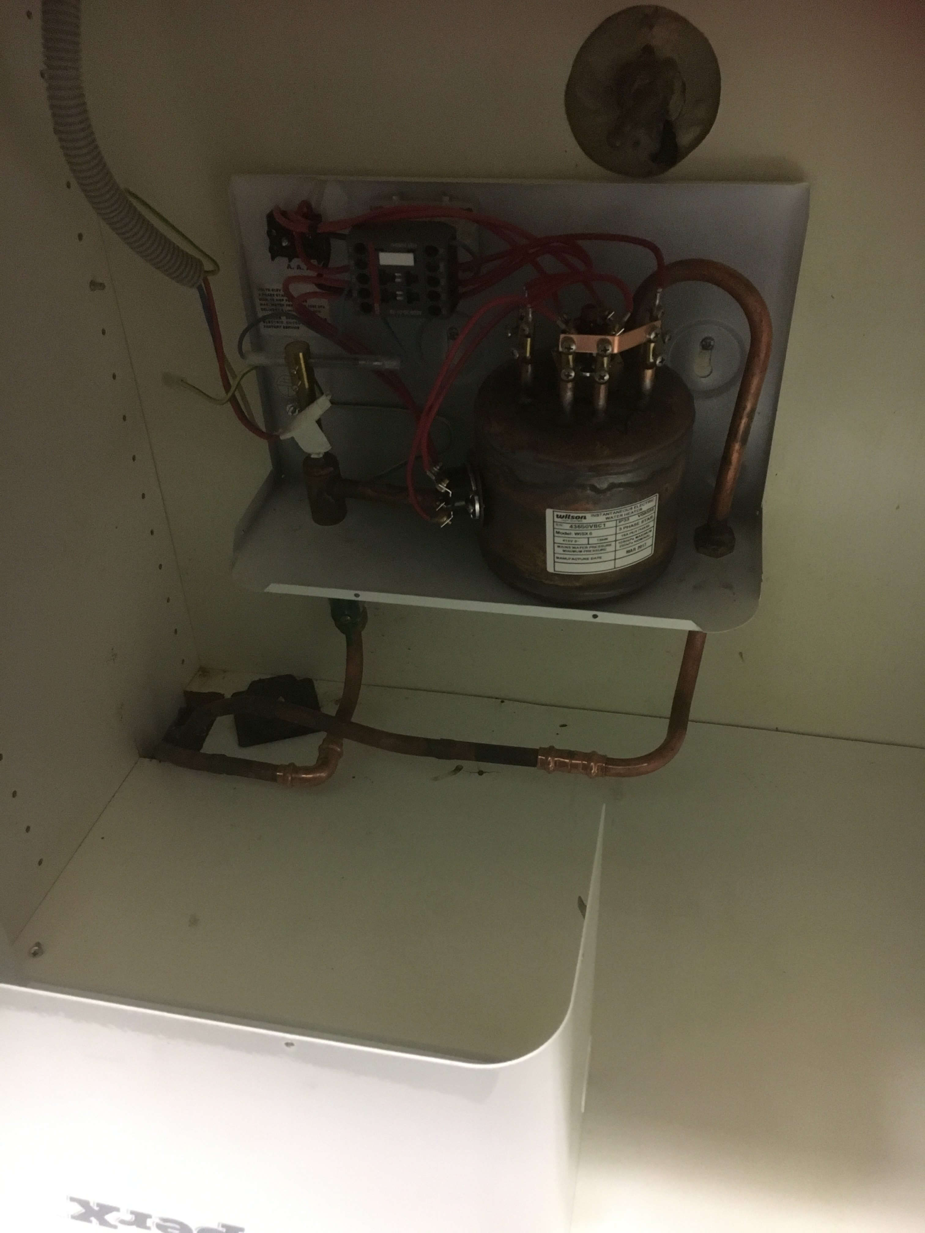 Everyday Plumbers Residential Hotwater Services - Machine in Repair Full View