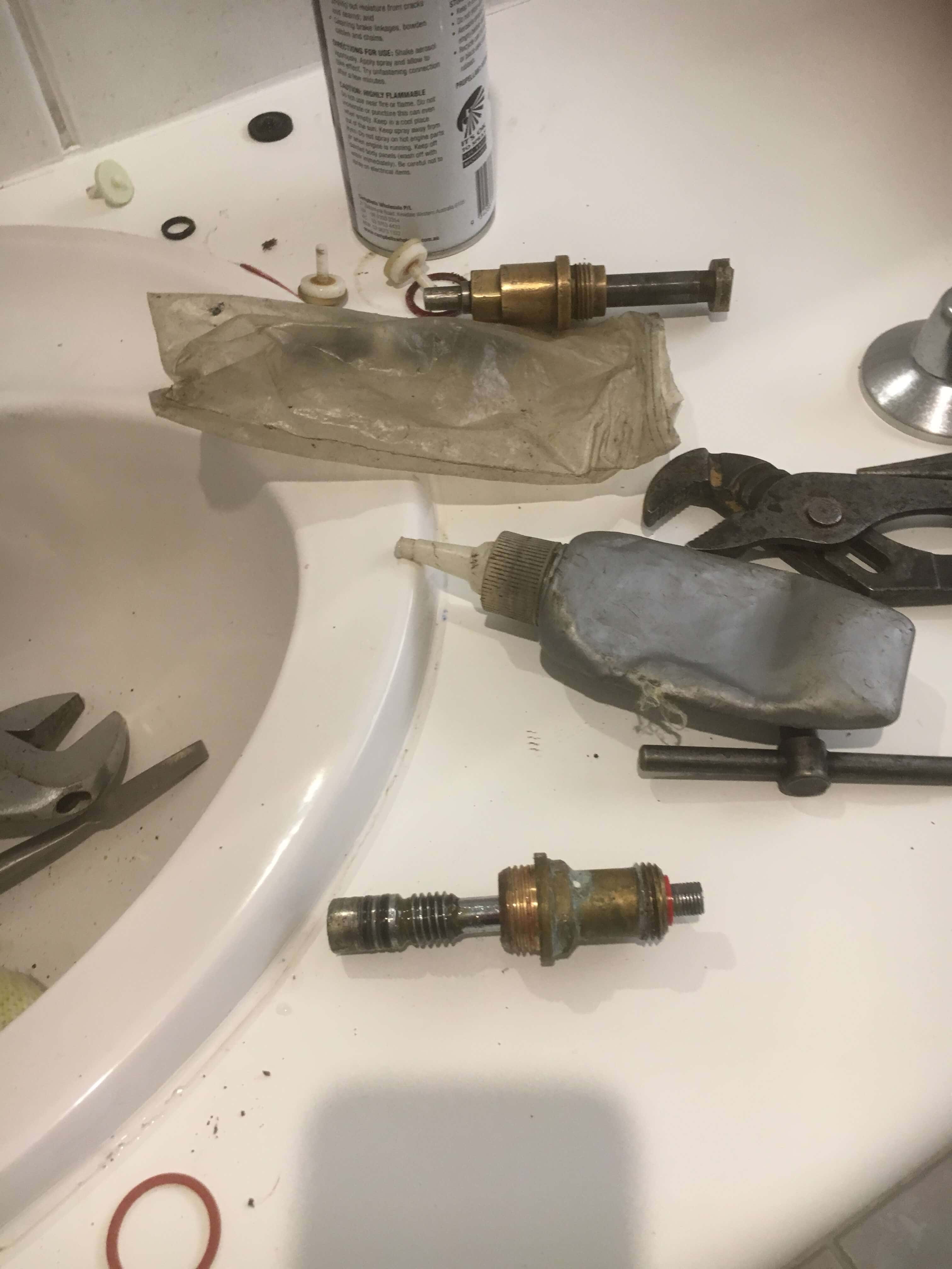 Everyday Plumbers Leaking Tap Repairs - Sink Accessories and Tools Above Ceramic Sink 2792