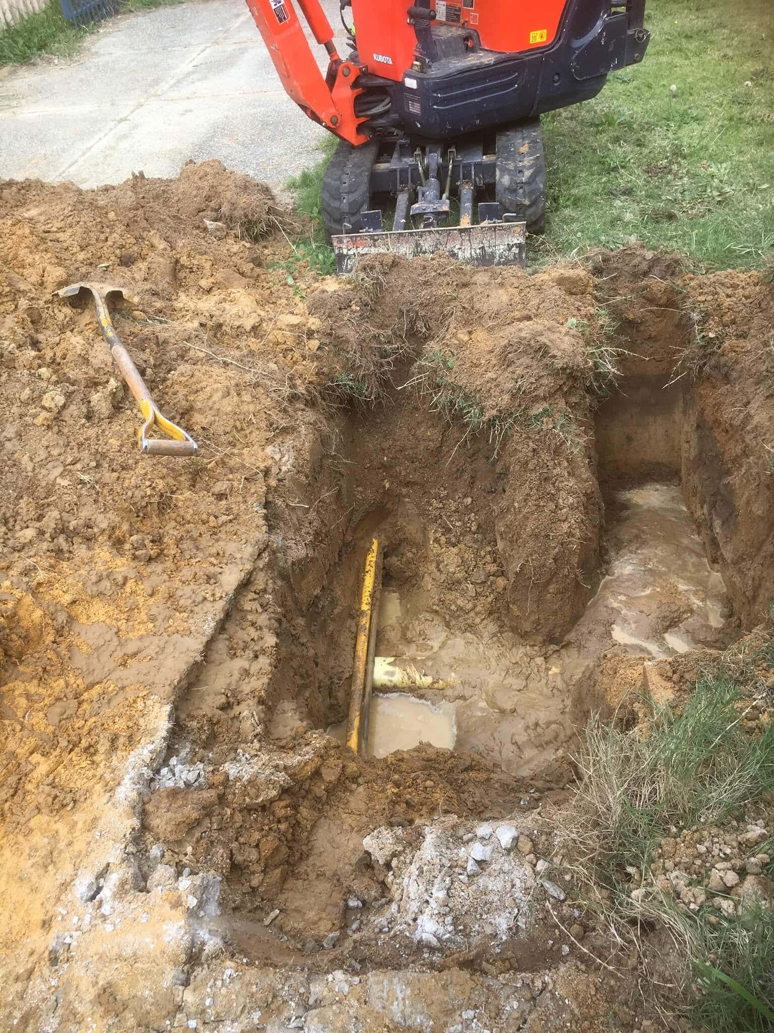 Everyday Plumbers Residential Locating Burst Pipes - Backhoe Digging in Action 2031